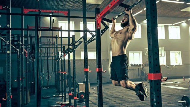 Puxada Frontal vs. Barra Fixa: Qual Exercício Realmente Constrói Mais Largura nas Costas?